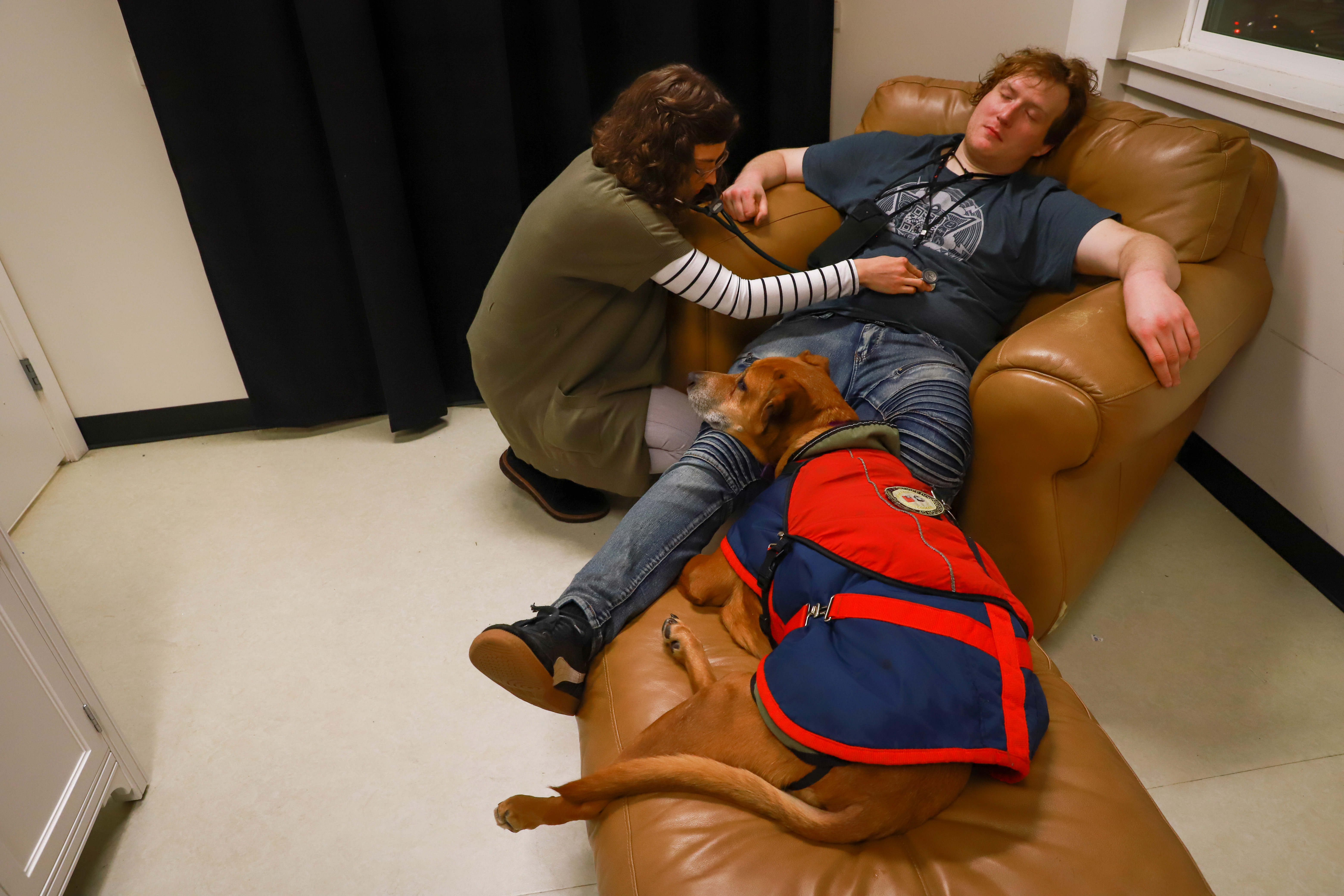  Following veterinary care for their pup, this owner then visits the nurse practitioner for follow up human care. The pet and owner have a single healthcare plan to follow, and the vet records are scanned into the human charts. Photo credit: Gemina Garland-Lewis